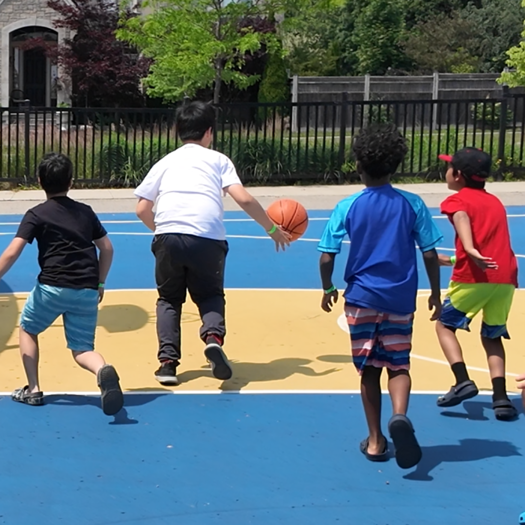 Kids playing basketball outside