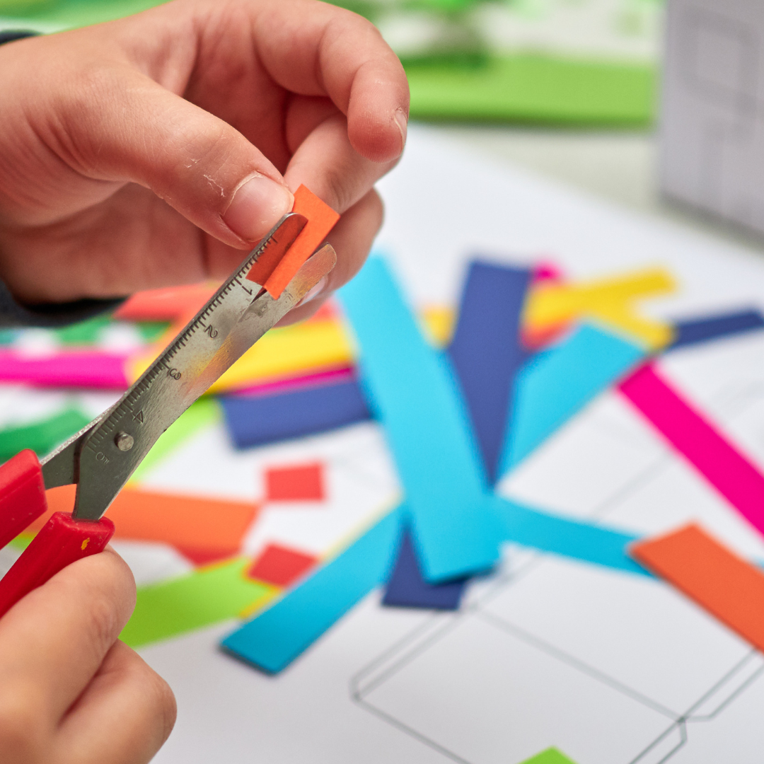 Cutting colourful paper - Before and After School at Wismer PS