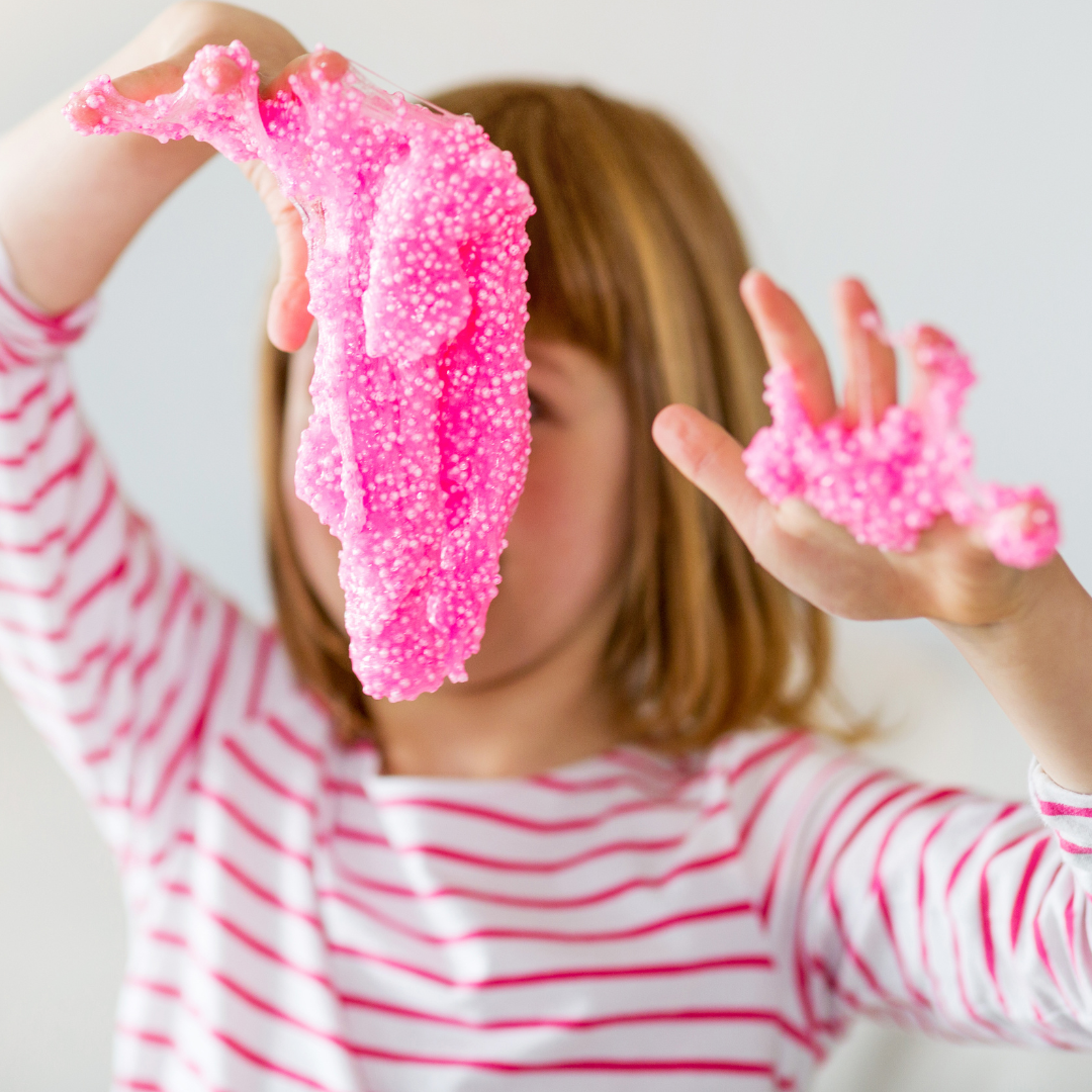 Child doing slime sensory activity - Before and After School at Wendat Village PS