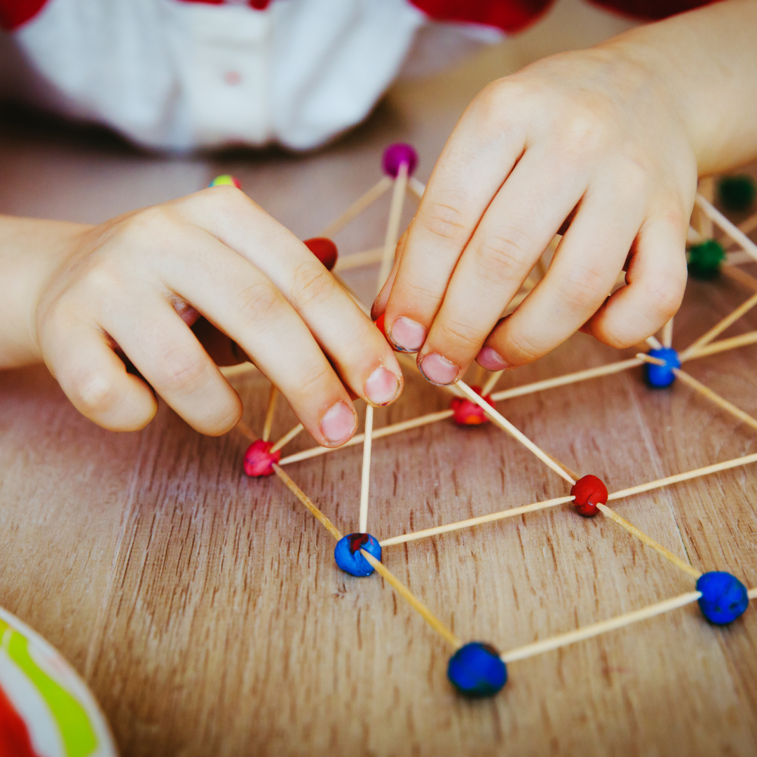 Building structures with connecting sticks and round pieces: UCCC at Armitage Village PS childcare programs