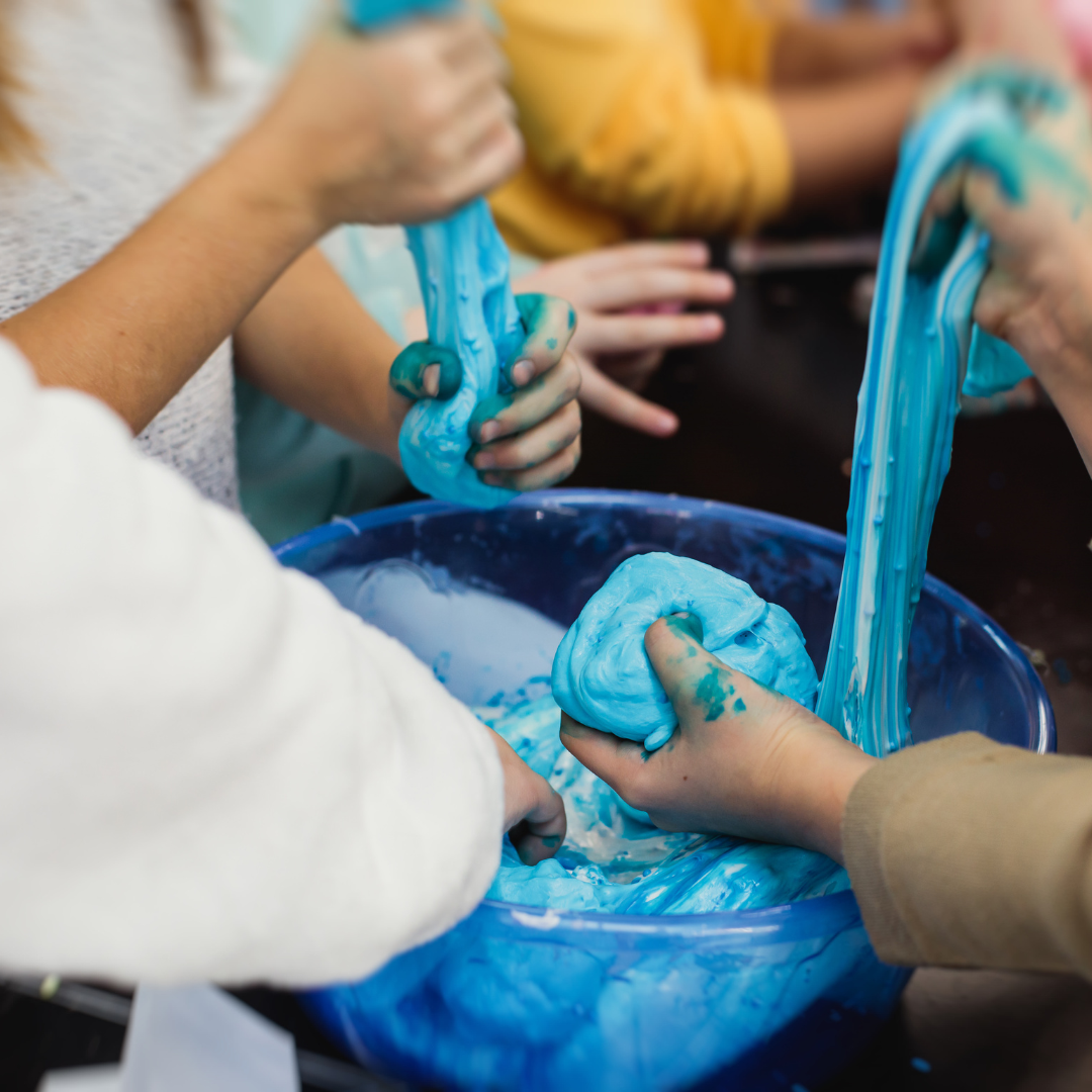 Kids doing sensory activity: slime - Before and After School at Rick Hansen PS