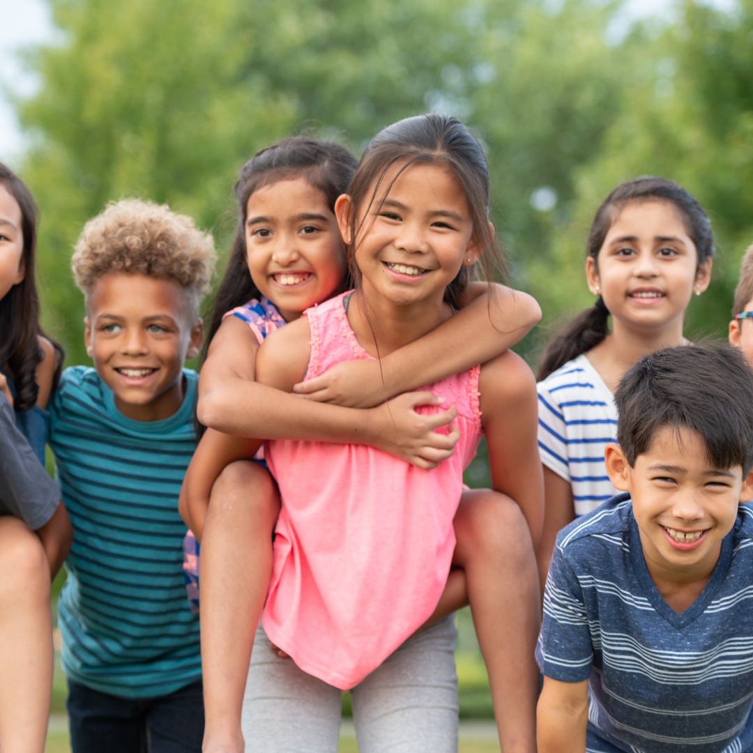 Smiling school age children outside - Before and After School at William Armstrong PS