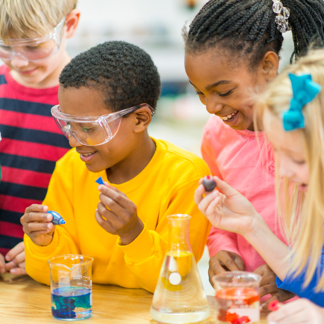 Children wearing googles, doing science activity - Before and After School at East Oro PS