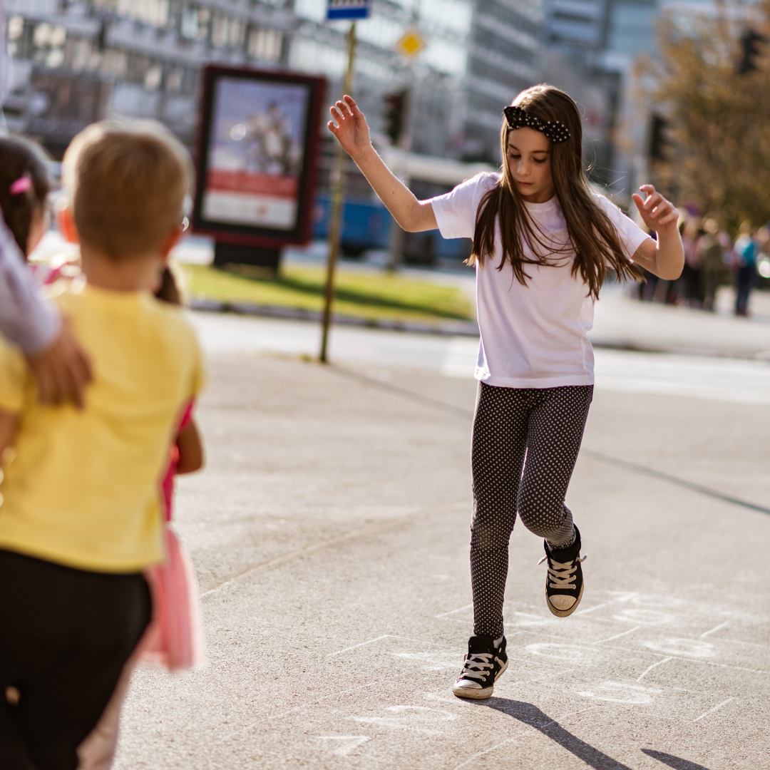 School age kids playing outside
