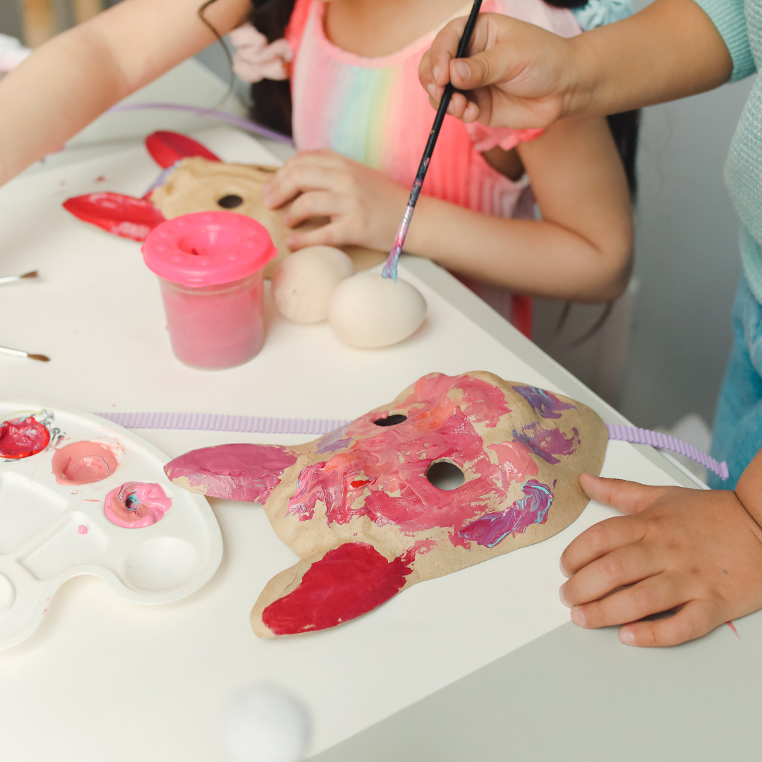 Children painting masks - Before and After School at East Oro PS