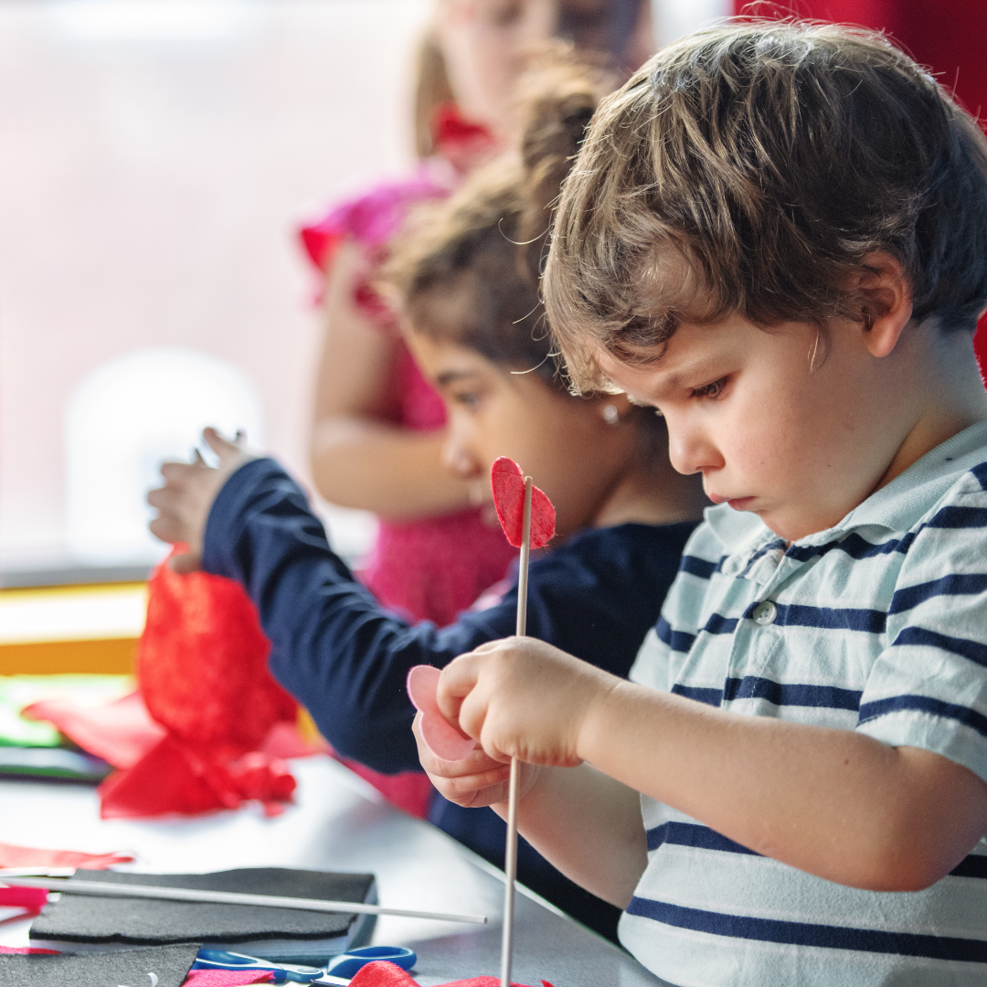 Children focusing on indoor activity