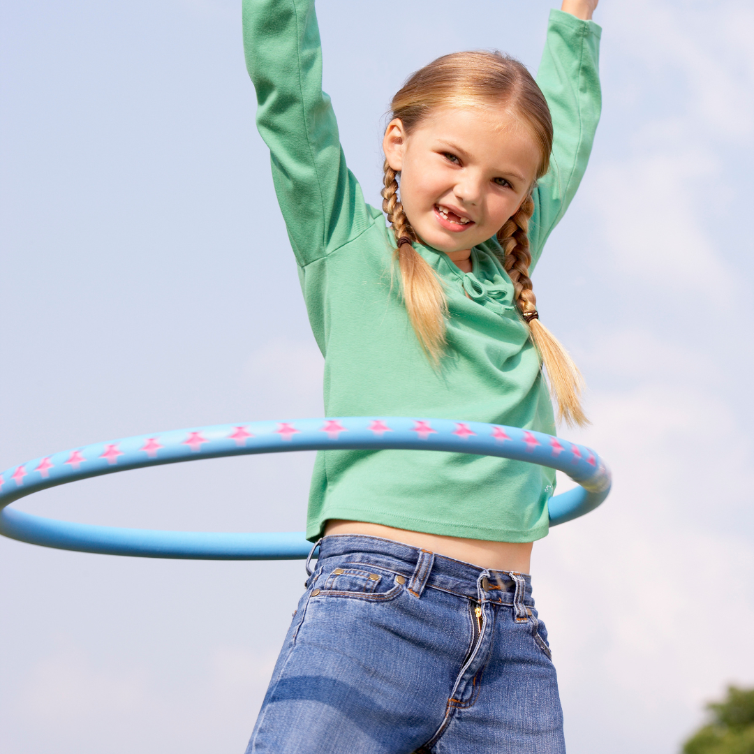 Kid hula hooping