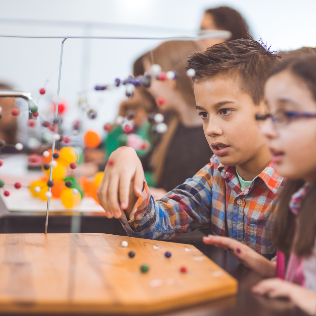 Children doing activities inside