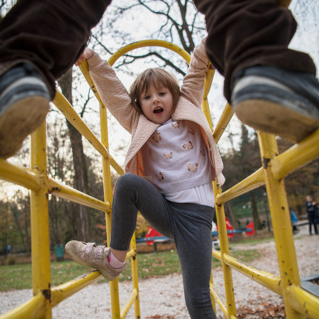 Kids climbing in playground