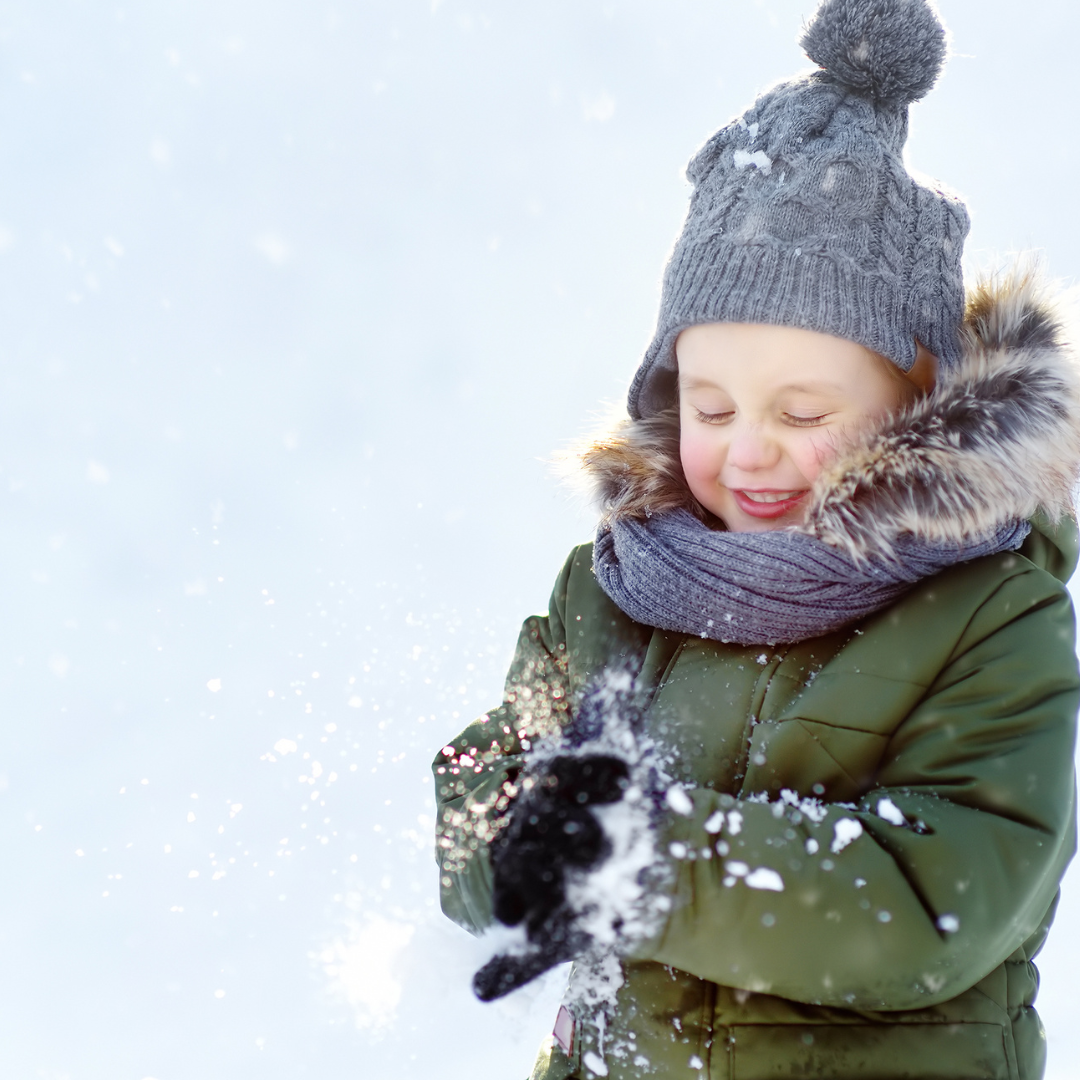 Smiling kid in the snow