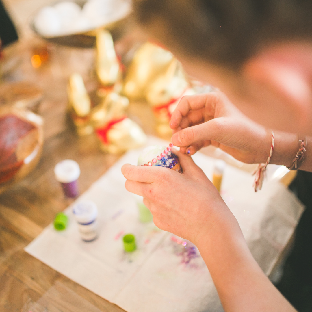 Close up of school age child doing art activity