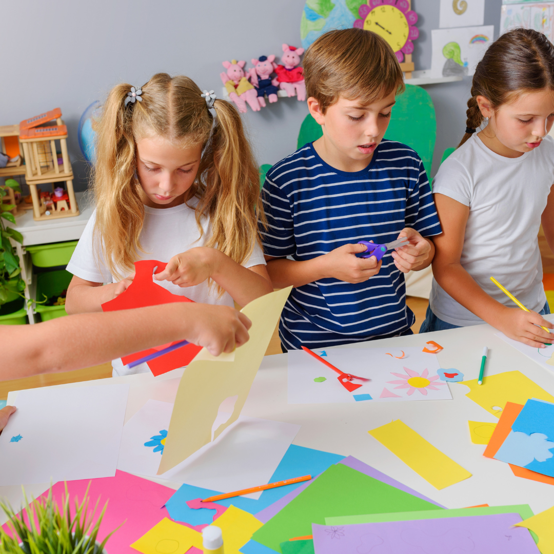 School age children doing arts and crafts
