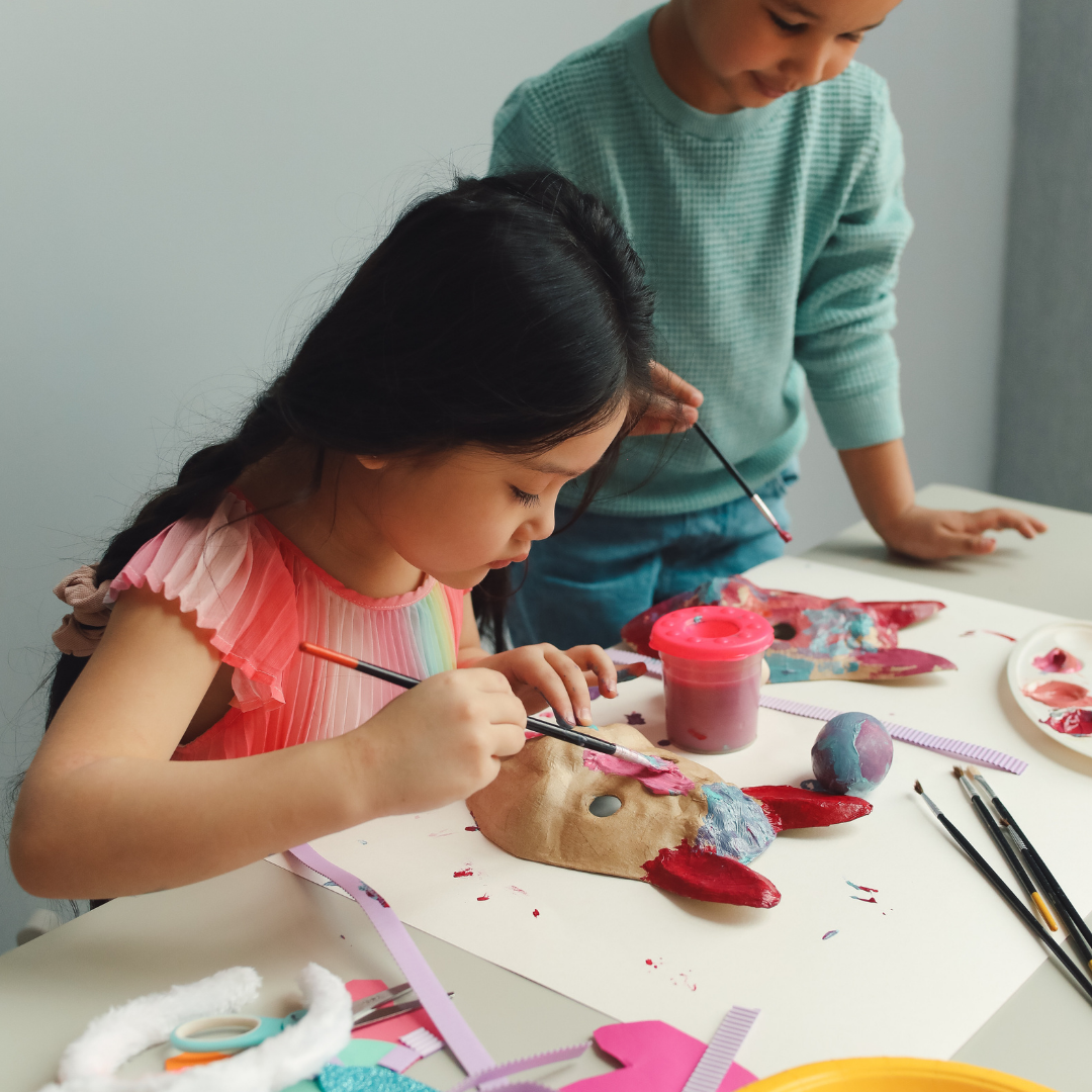 Children painting masks - Before and After School at Clearmeadow PS
