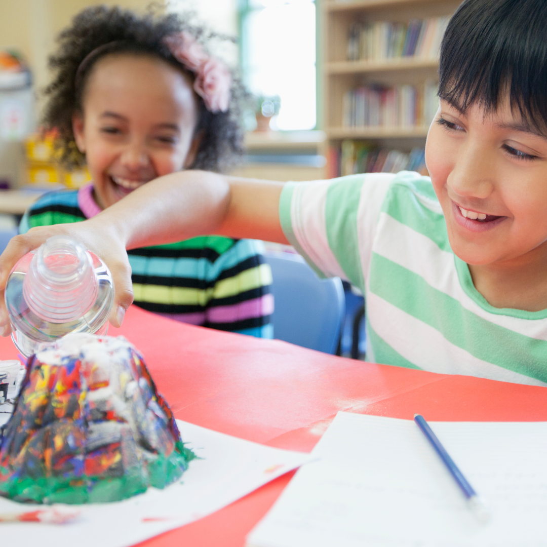 Children inside doing volcano experiment