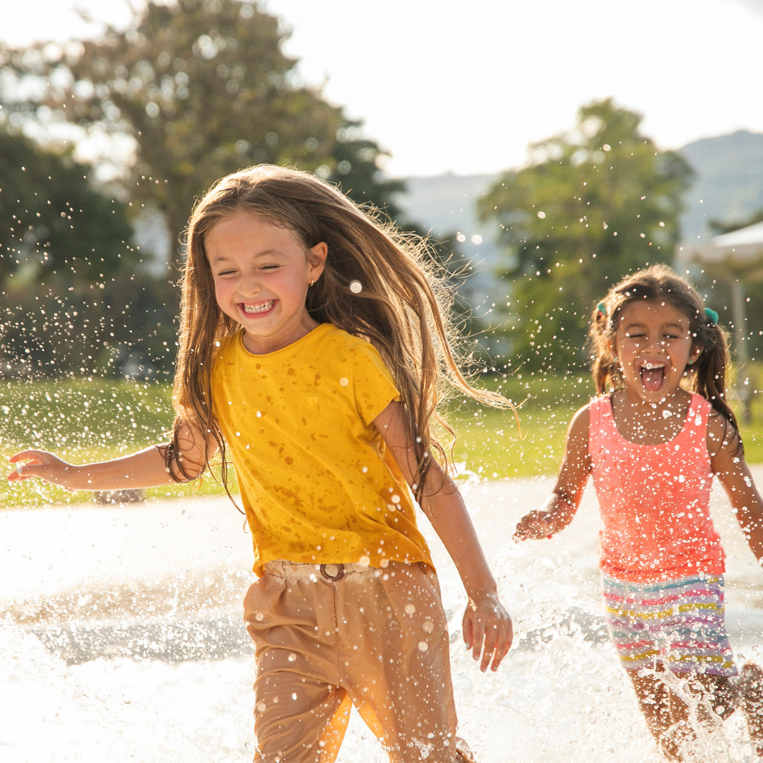 Kids playing in splash pad