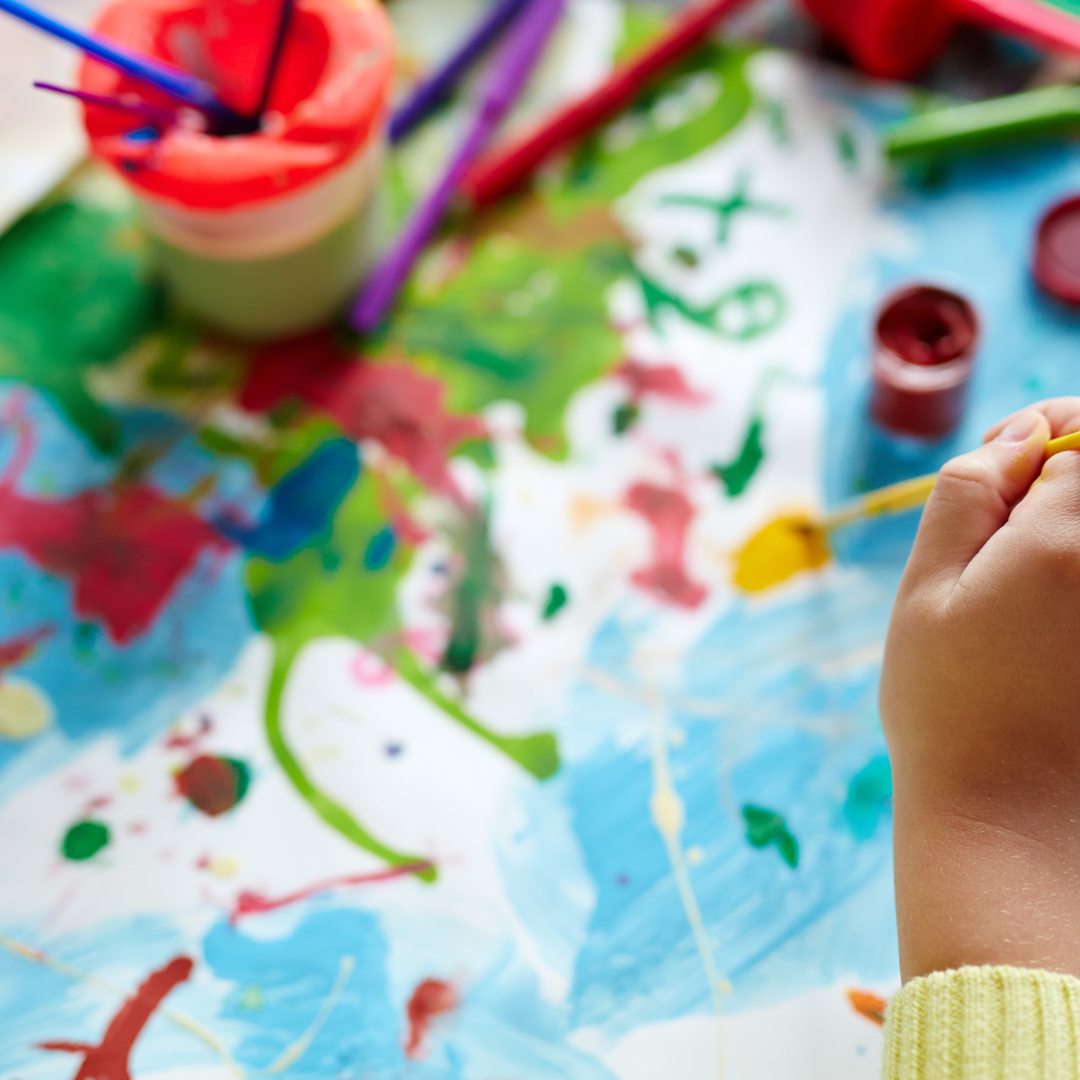 A child's hand painting
