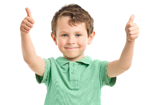 Smiling child giving two thumbs up