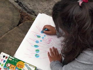 School age child, drawing a picture