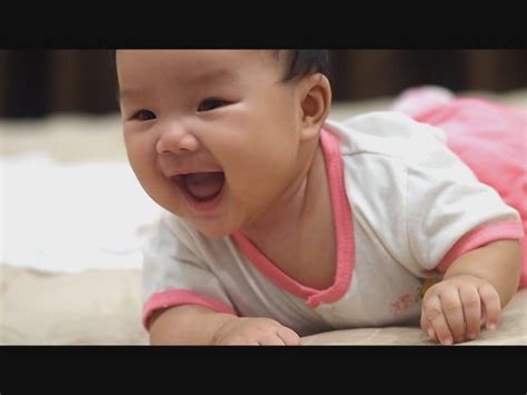 Smiling crawling baby