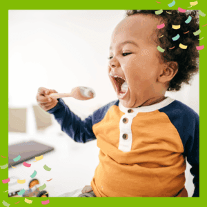 Toddler feeding themself