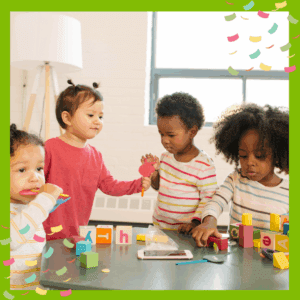 Toddlers playing at a table