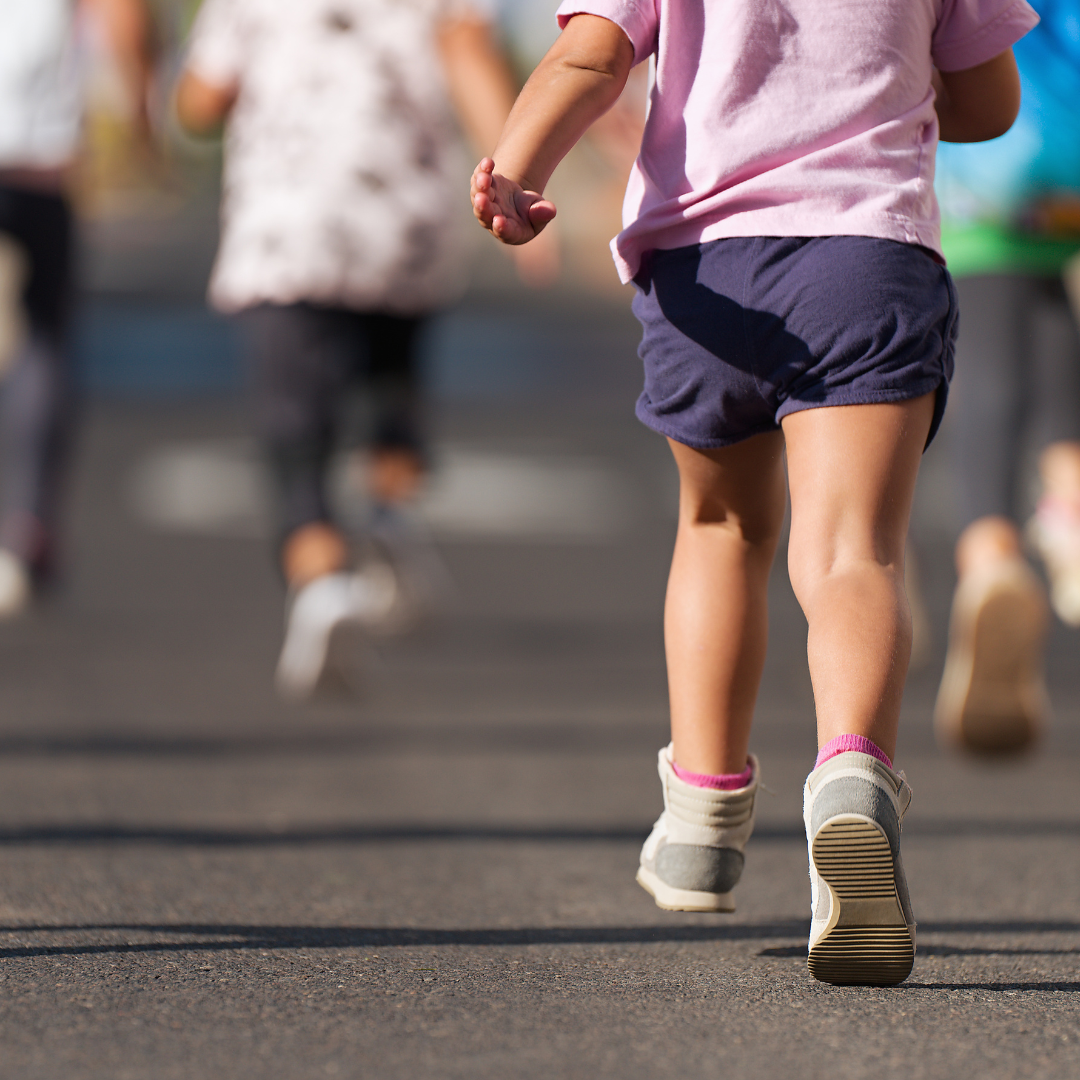 School Age kids running outside